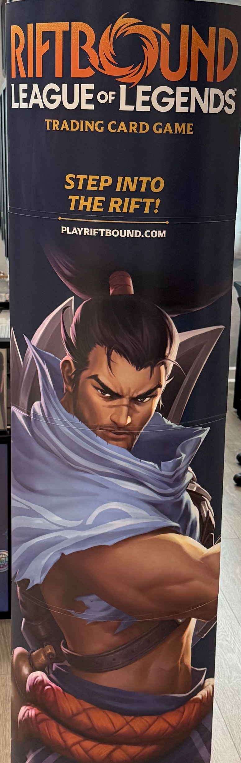 A Riftbound League of Legends trading card game standee in the shop